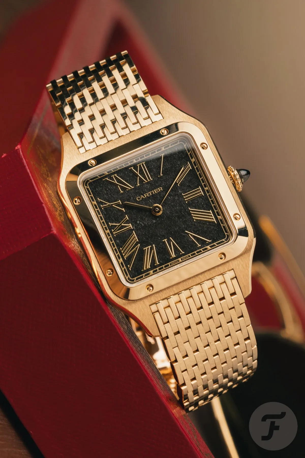Cartier Santos-Dumont gold with black obsidian dial