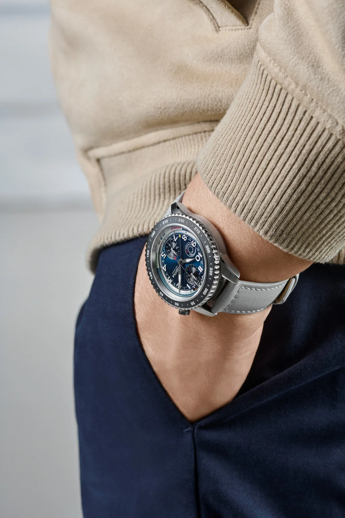 Engraved case back of the Watch Angels × Alpina watch