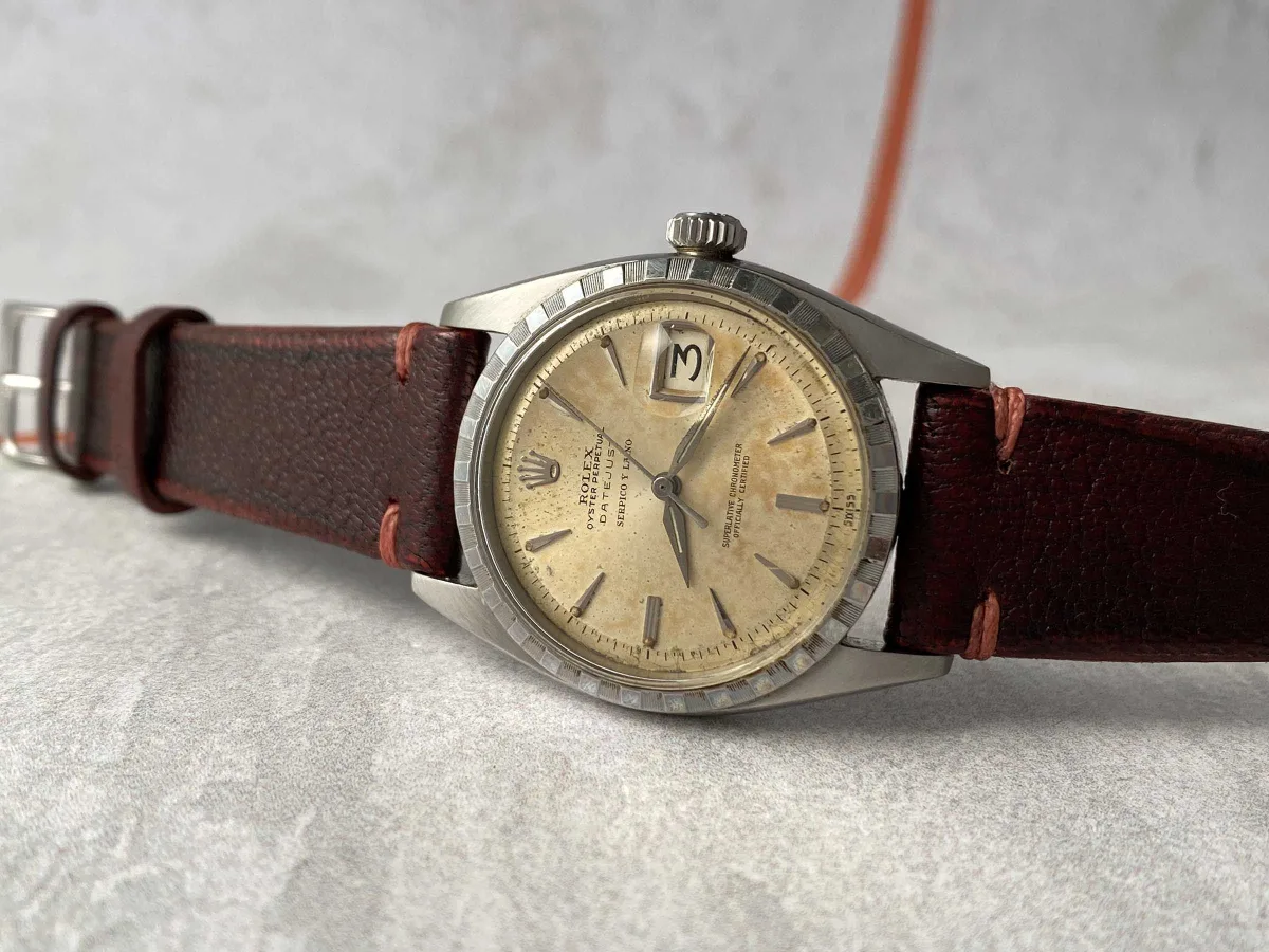 Watch with Serpico Y Laino signature, highlighting prestigious partnership.