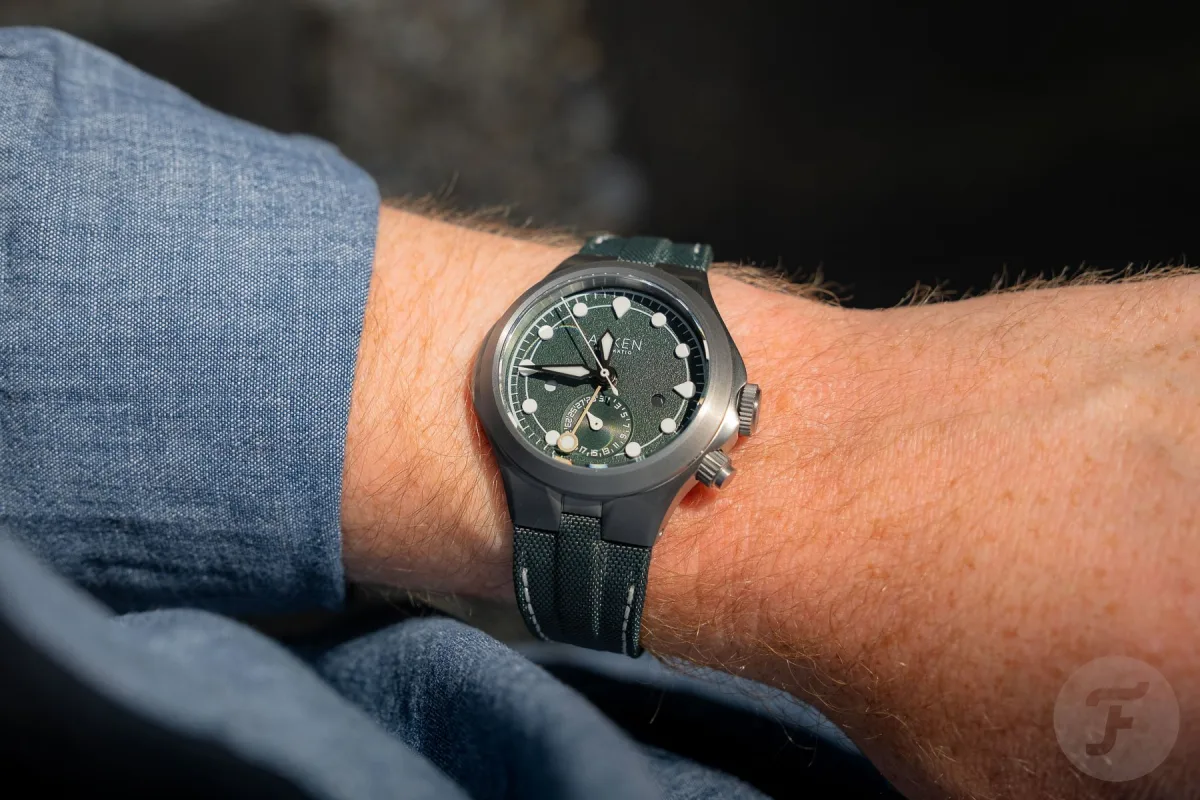 Arken Alterum Sage Grey GMT watch with green dial.