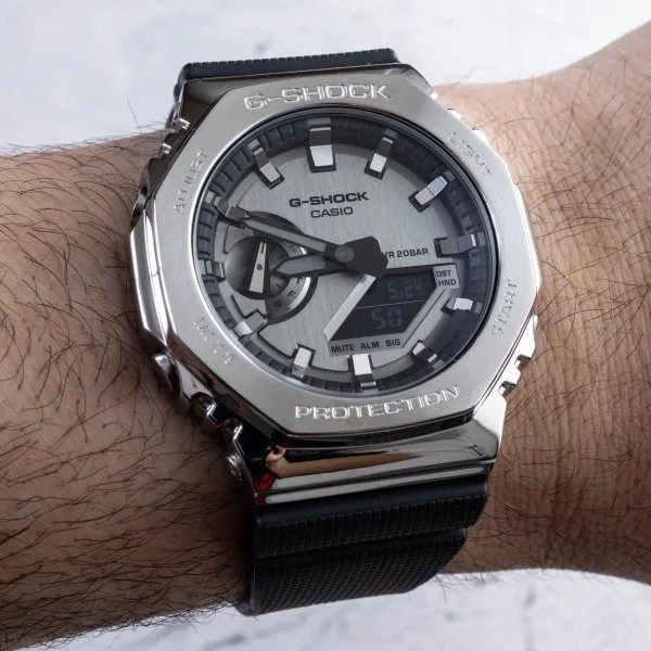 Casio GM-2100 watch with deep gray dial and polished steel case.