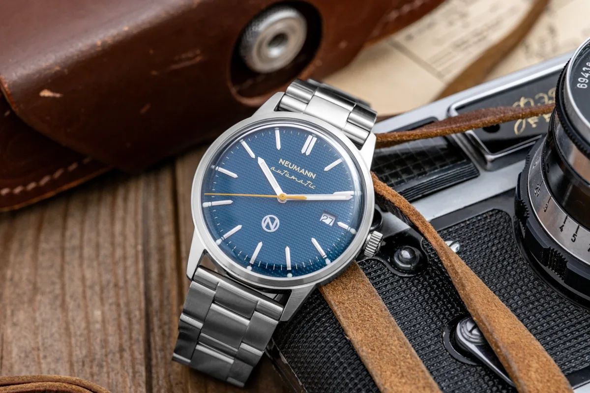 Neumann Automatic watch showing luminescent accents