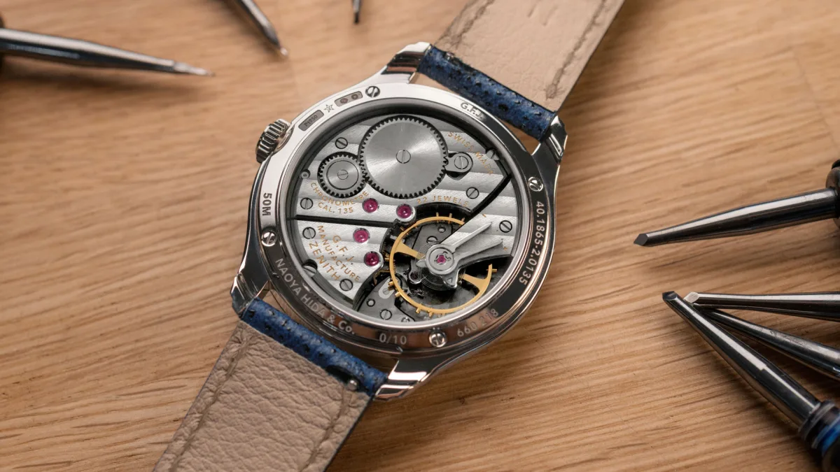 Calibre 135 movement through sapphire case back