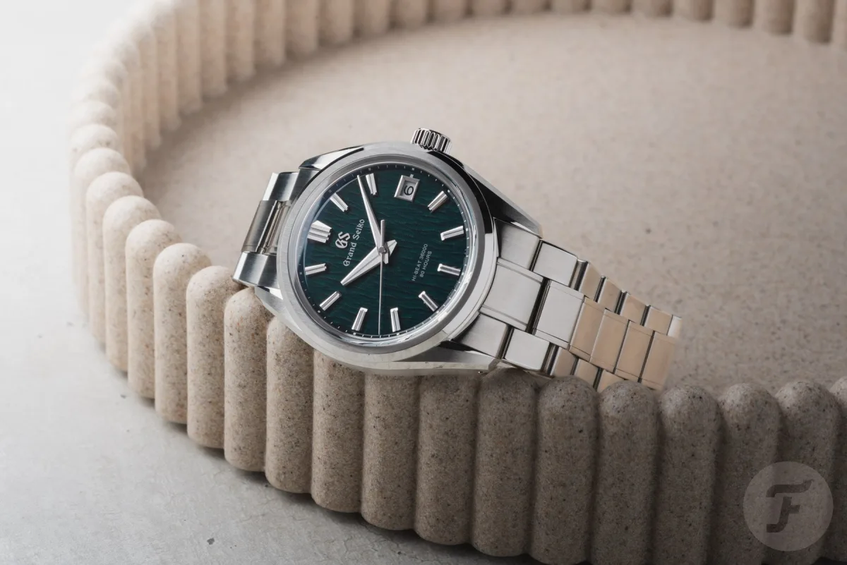 Side view of Grand Seiko Evolution 9 Hi-Beat watch showing case thickness