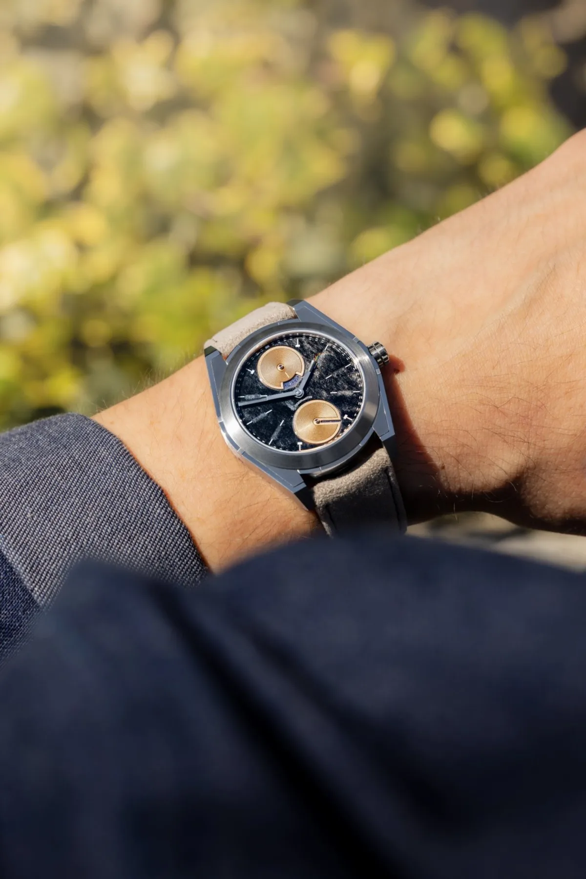 Close-up of natural stone dial with indices