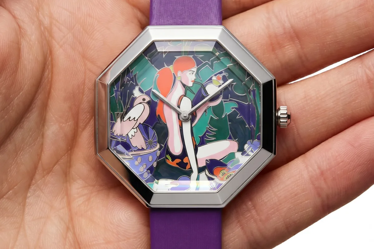 Detailed enamel artwork on watch dial