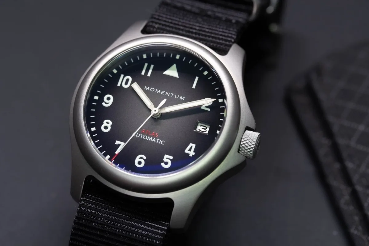 Pilot-inspired dial of Momentum Atlas with clear numerals
