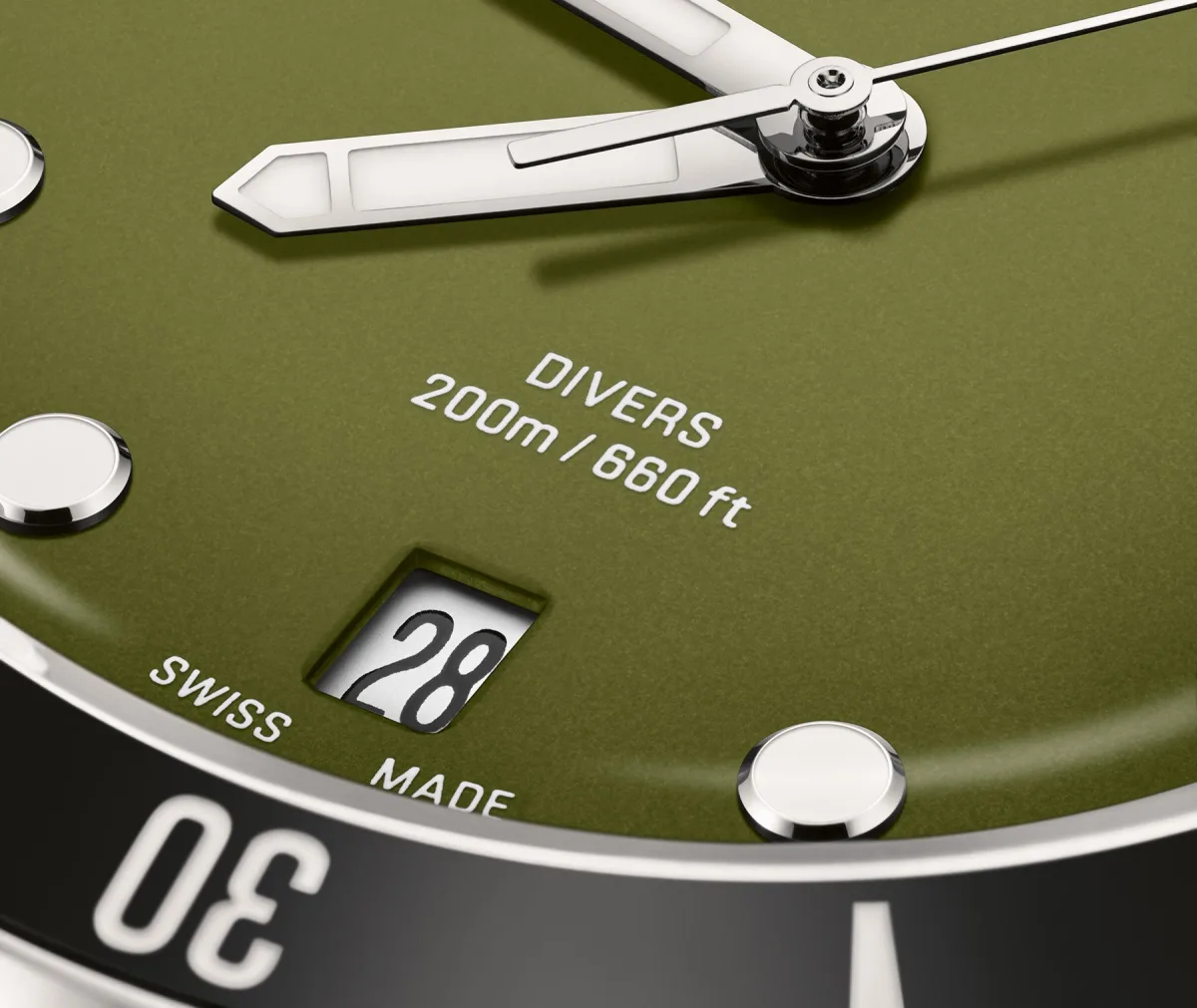 Close-up of Oris Divers Date dial with green finish
