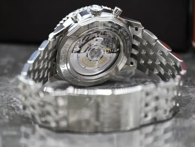 Close-up of a watch movement, showing technical details