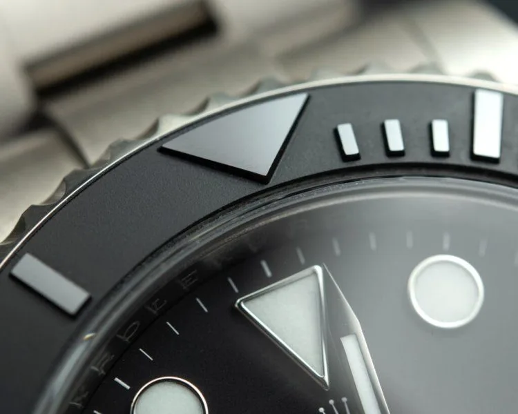 Watch with sapphire glass reflecting light