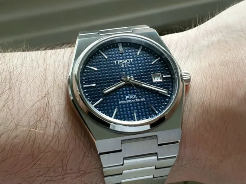 Tissot PRX Powermatic 80 with integrated bracelet and embossed dial