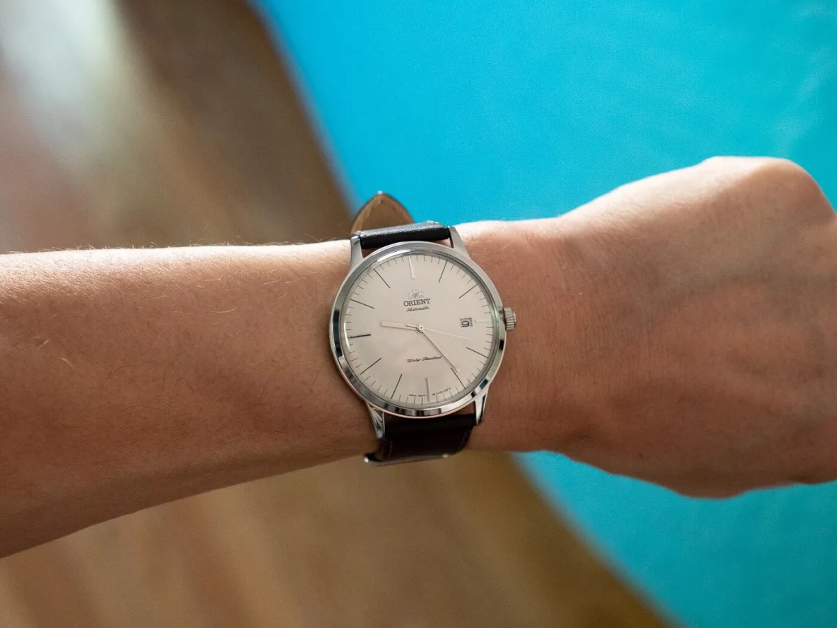 Orient Bambino V3 on wrist illustrating compact size