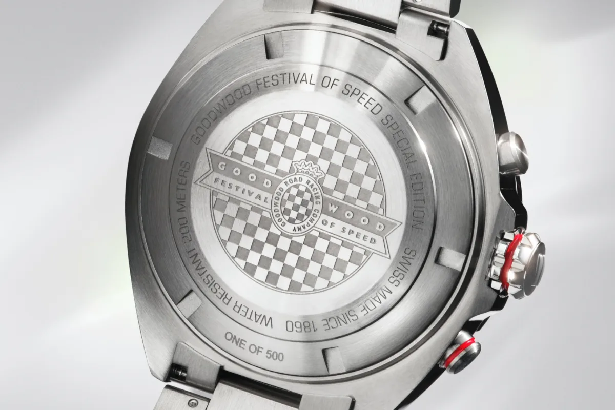 Close-up of TAG Heuer watch dial with green color and azurage texture