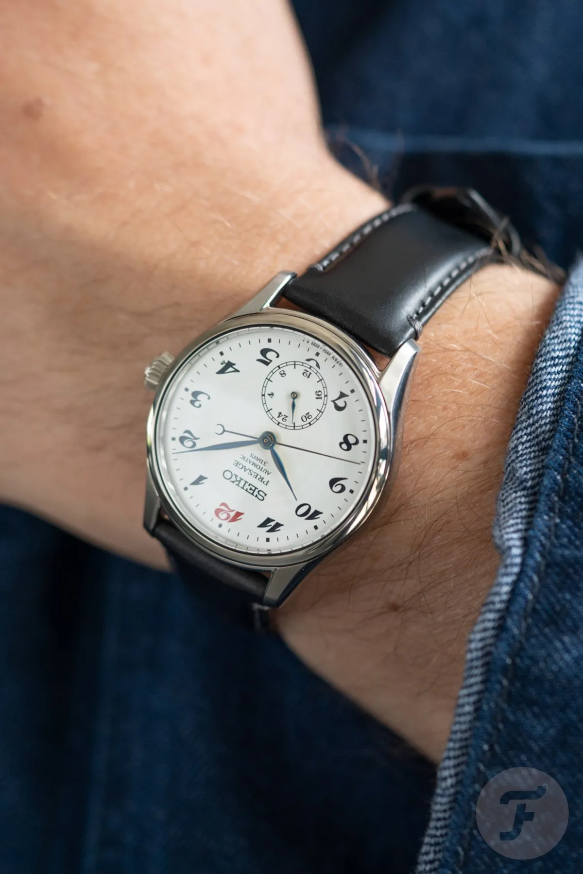 Craftsman working on Seiko enamel dial