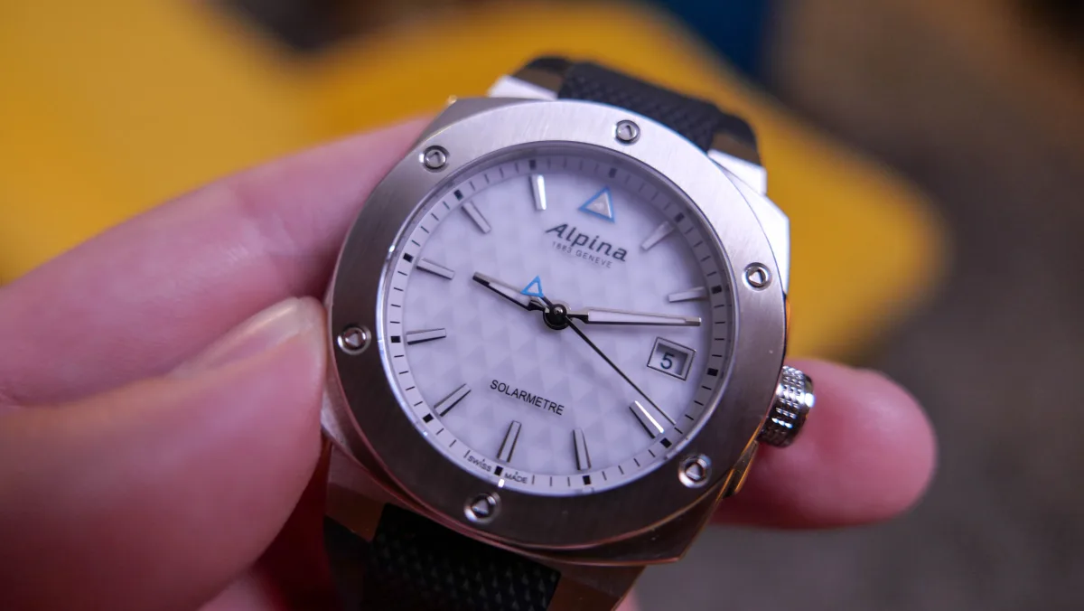 Dial of Alpiner Extreme Solarmetre with mountain emblems