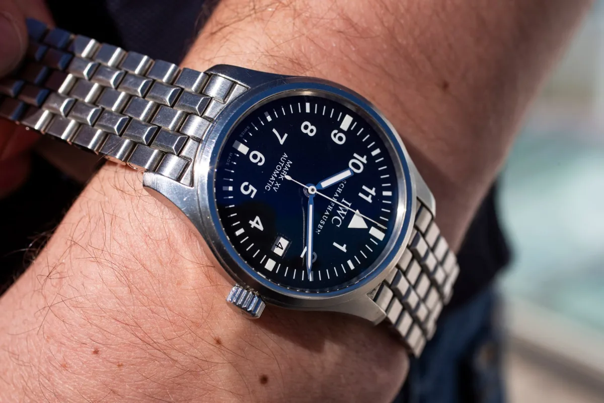 Close-up of a field watch with luminescent markers