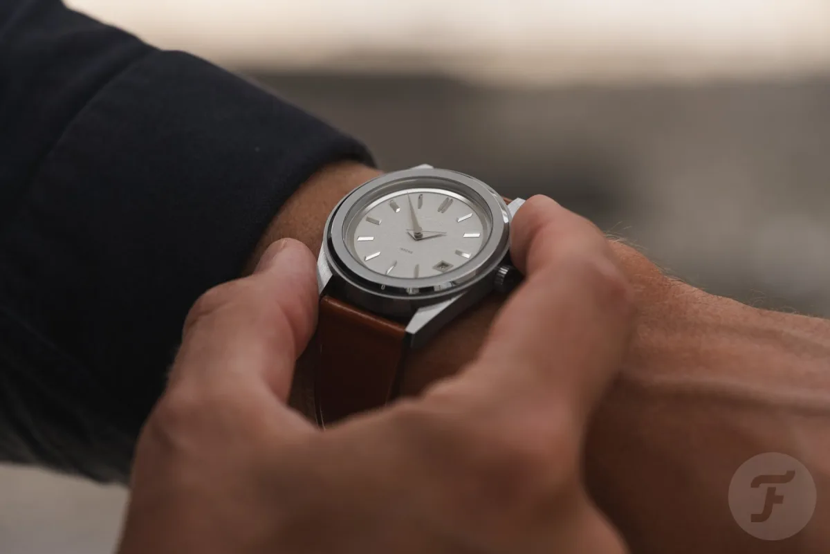 Laps Arche on wrist, showing case and dial harmony