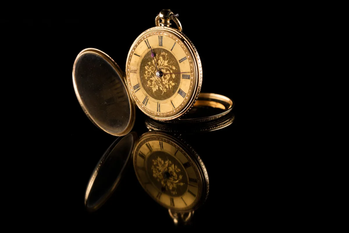 Pocket watch with gold casing