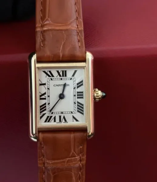 Cartier Tank Louis Cartier watch with its iconic rectangular design.