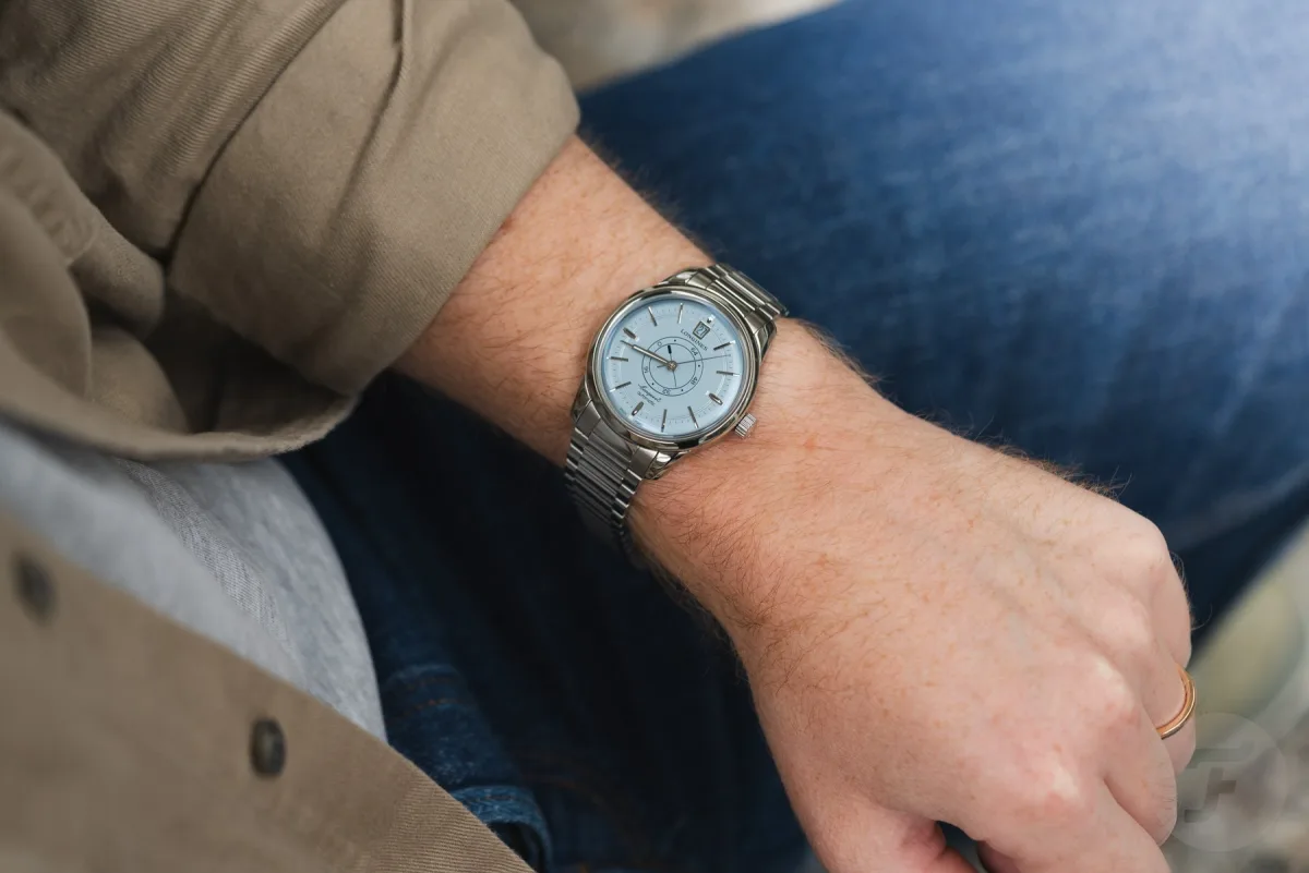 Polished hands of Longines watch with Super-LumiNova