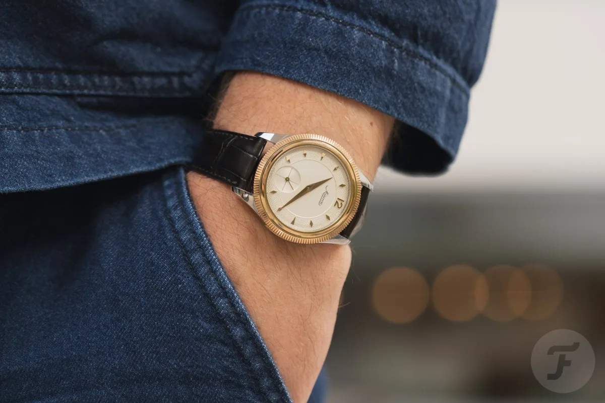 Minerva watch with dark green alligator strap