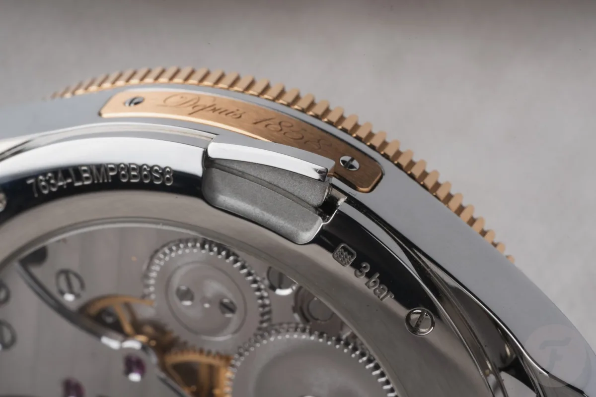 Close-up of the rose gold bezel on the Minerva watch
