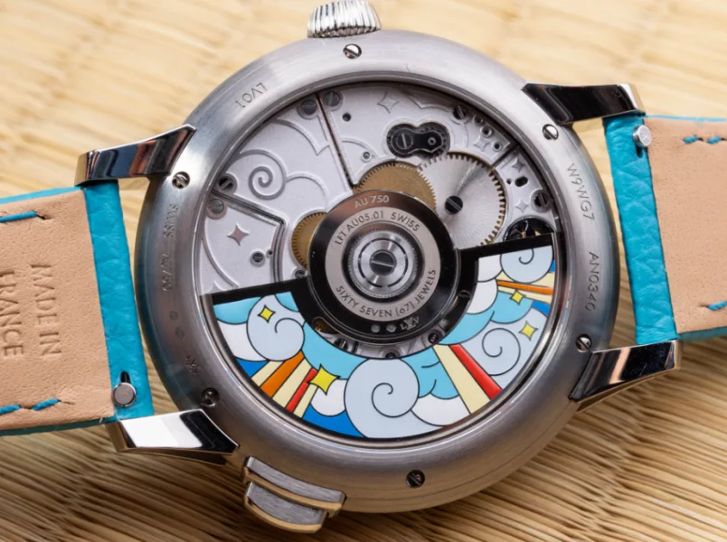 Louis Vuitton Tambour Taiko Arty Automata case with rainbow baguette rubies and sapphires