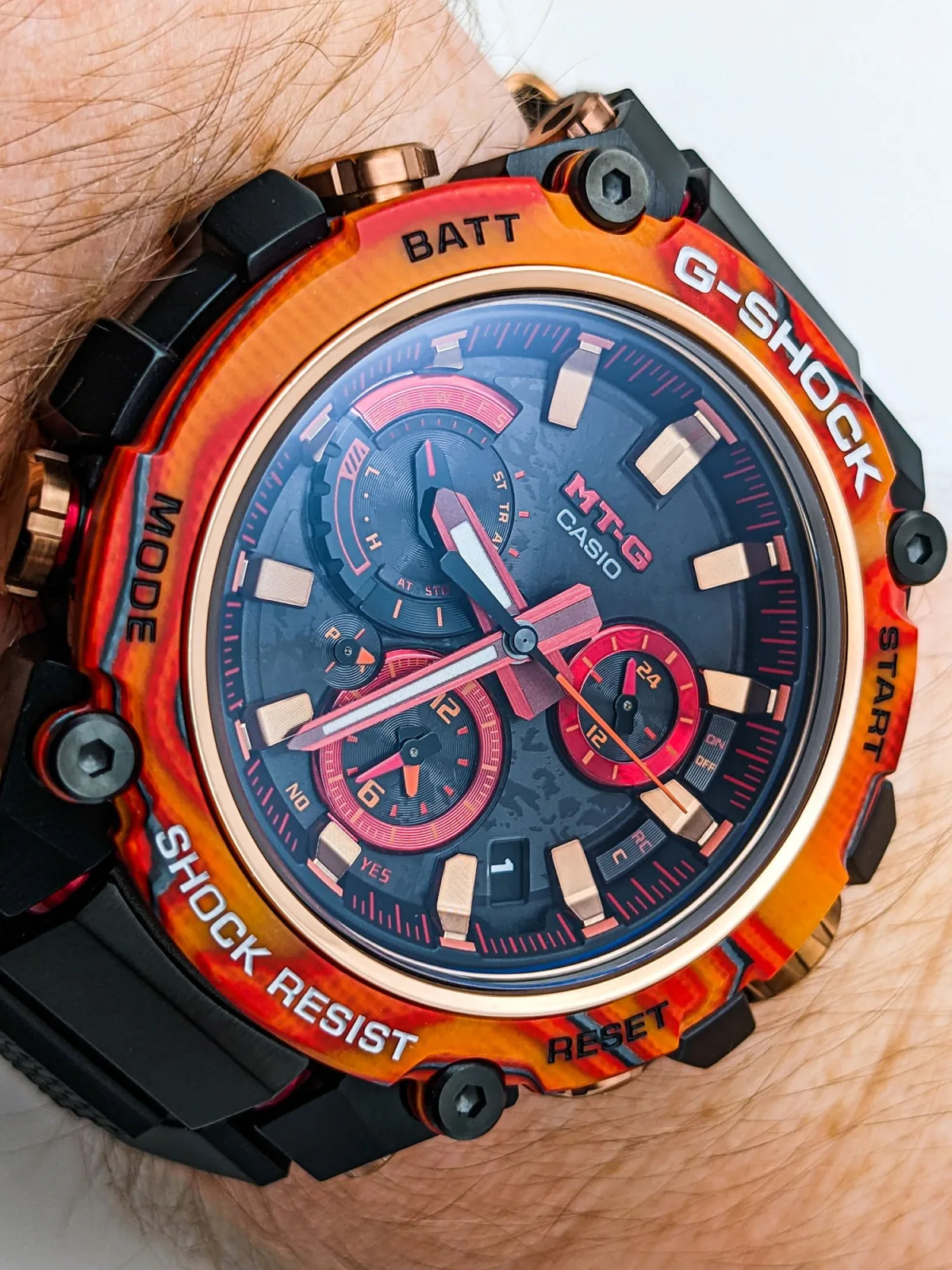 MTGB3000FR-1A dial detail with fiery bezel