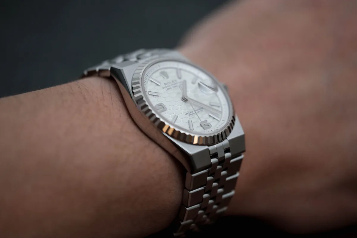 Rolex Land-Dweller 36mm on wrist showing integrated bracelet